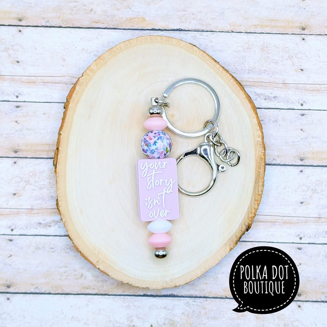 Your story isn't over Silicone Keychain